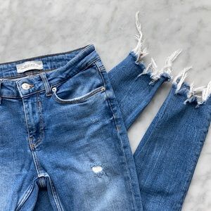 Zara Woman premium denim- blue light wash ripped denim.